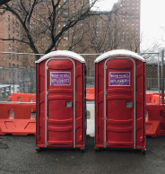 Red porta potties for events in Manhattan, NY