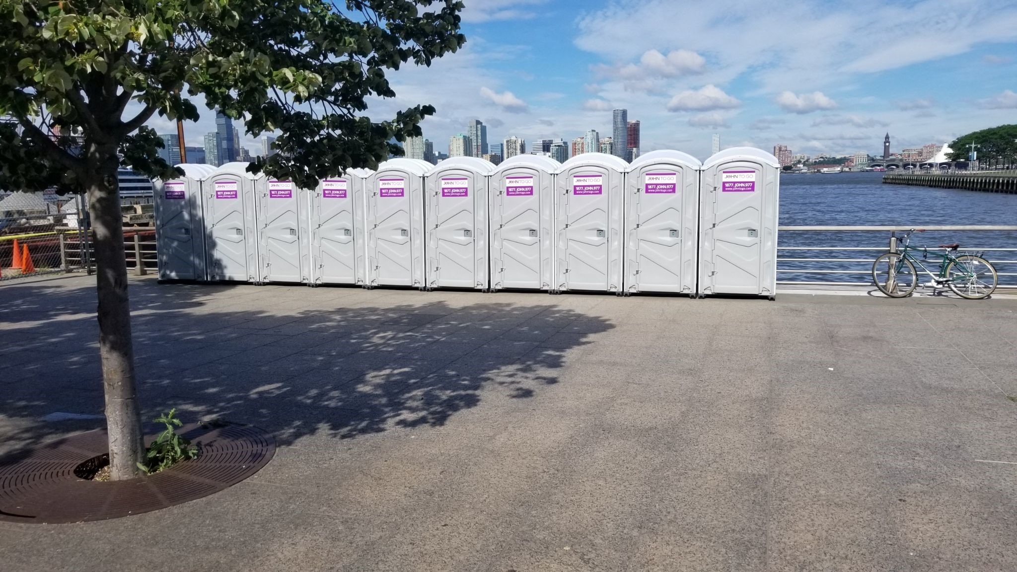 Mobile toilets at event next to water