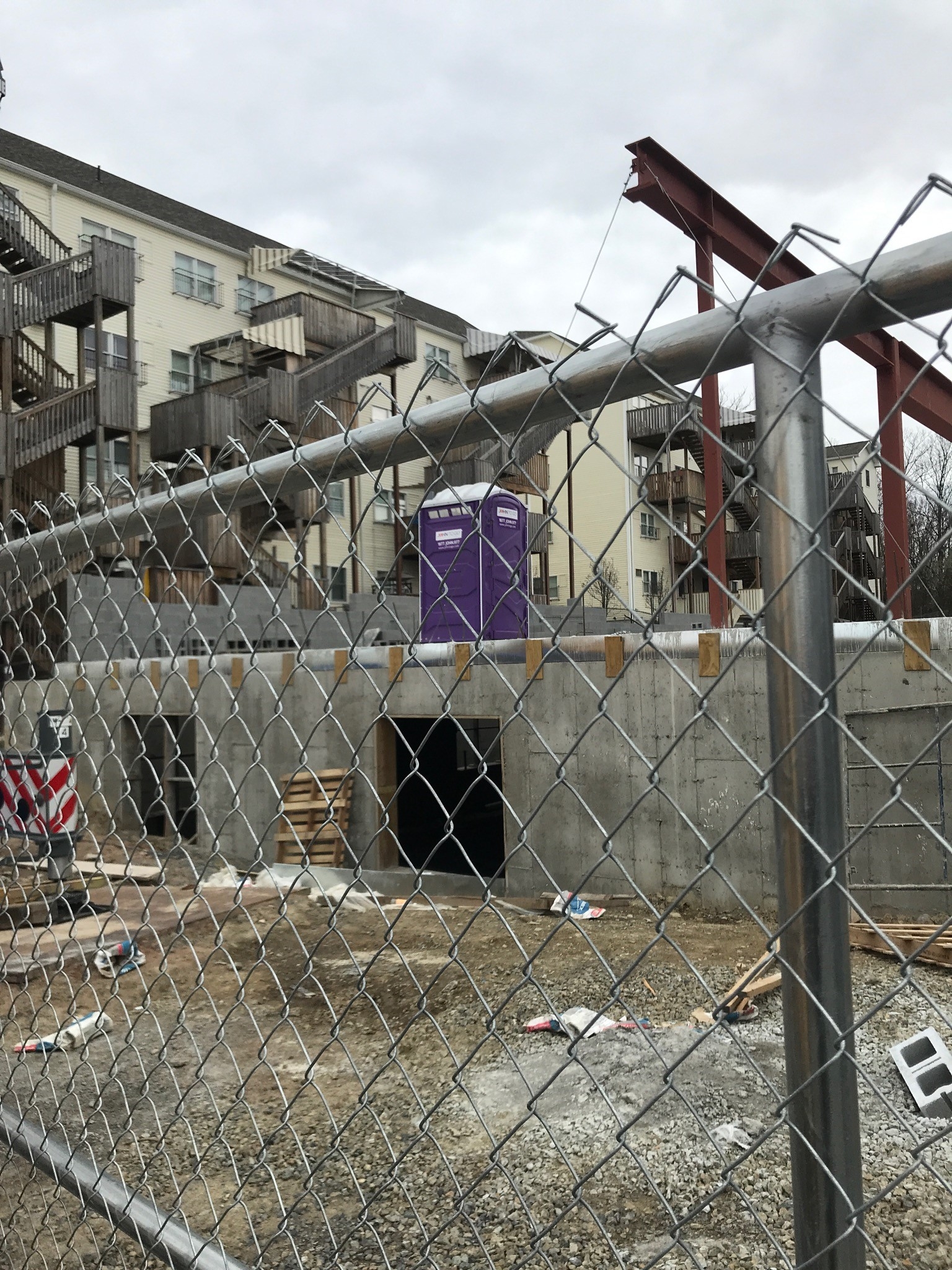 Portable toilet at construction site