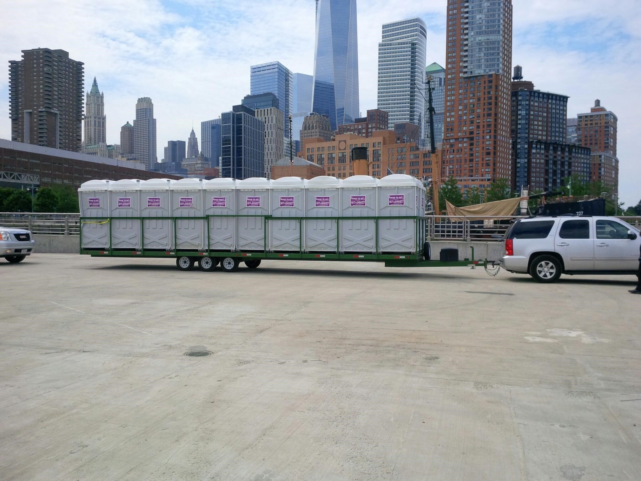 porta potty units being delivered