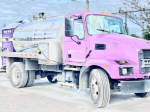 John To go servicing truck with port o potty unit