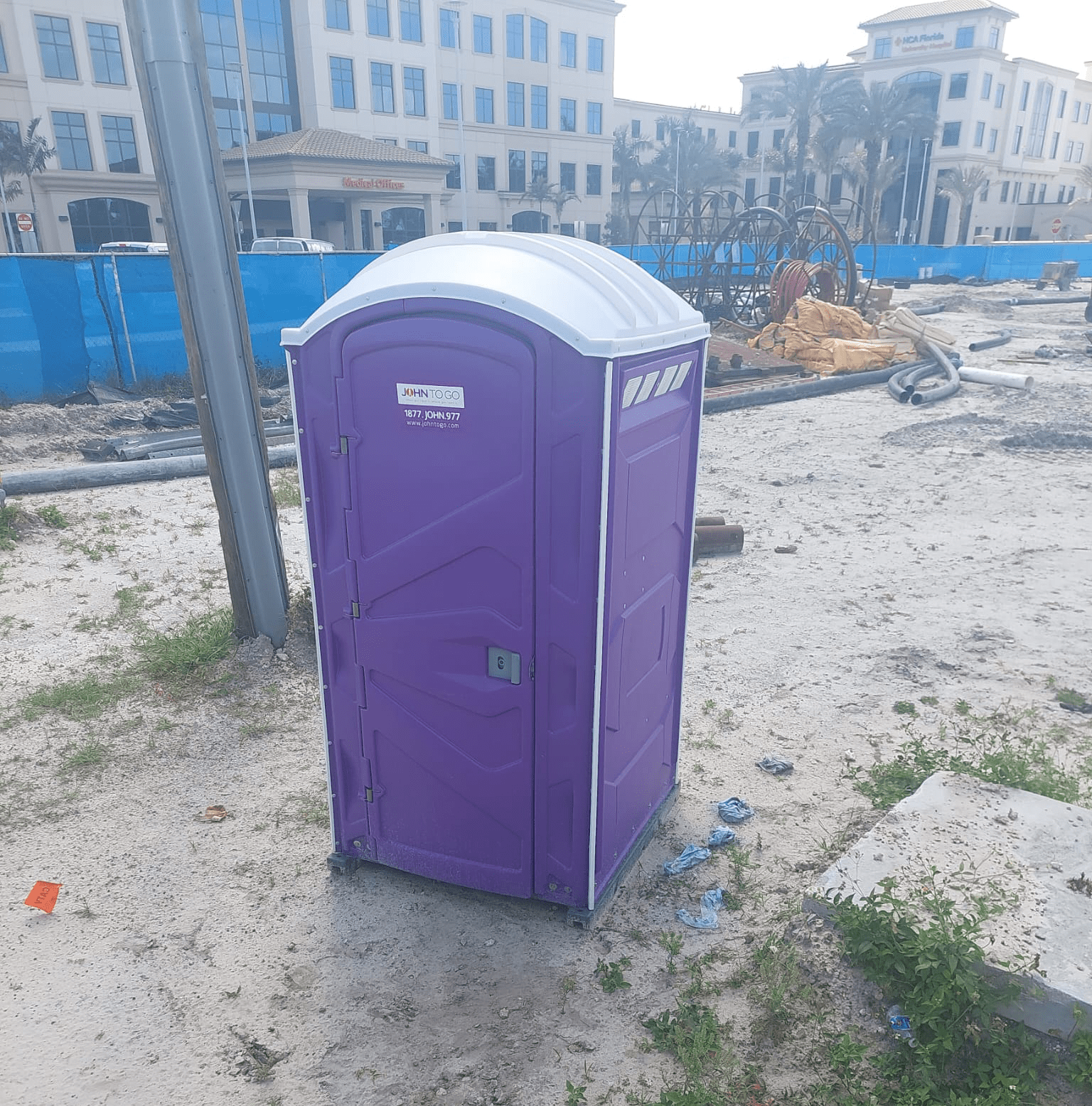 porta john unit at Davie, Florida construction site