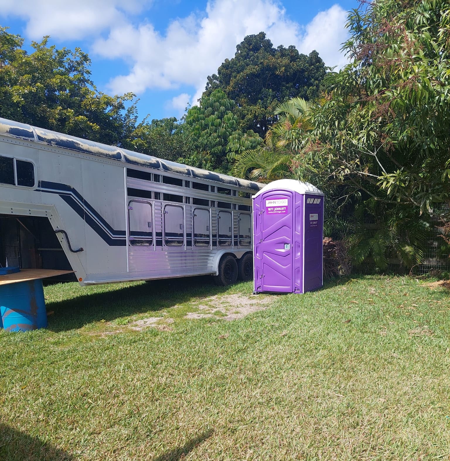 purple port a potty outdoors