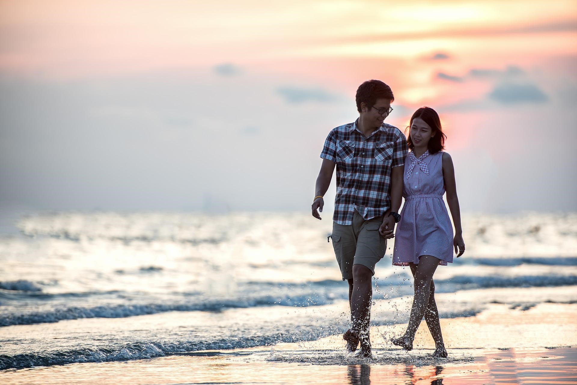 couple walking on beach