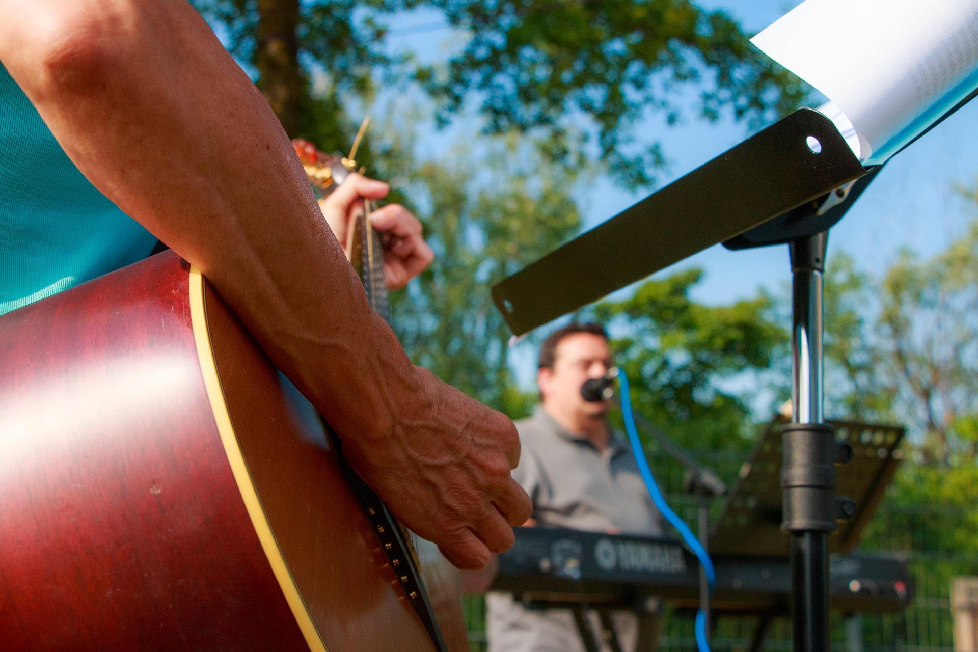 band playing at outdoor concert venue