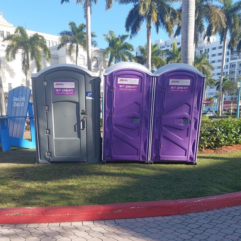 ADA port o potty and purple porta john near Sarasota County