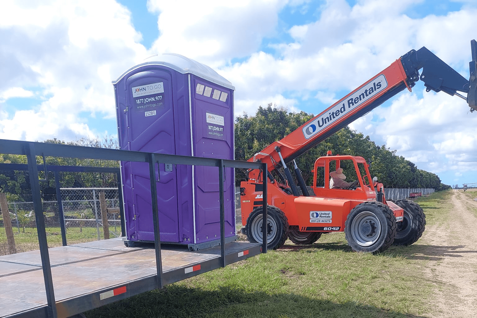 construction porta potty on trailer