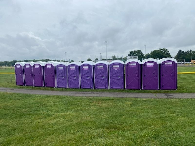 row of affordable porta potty rentals