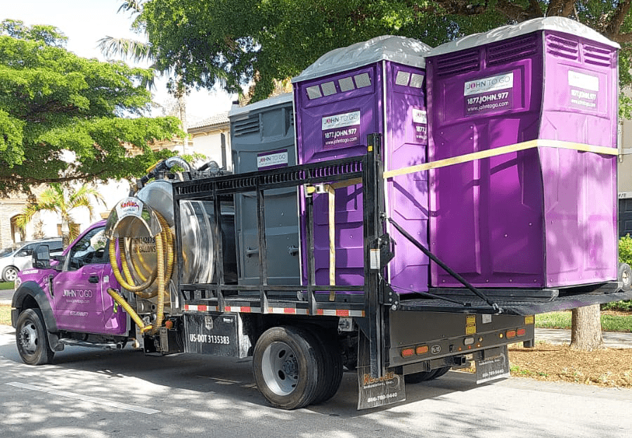 truck delivering and servicing porta potty units