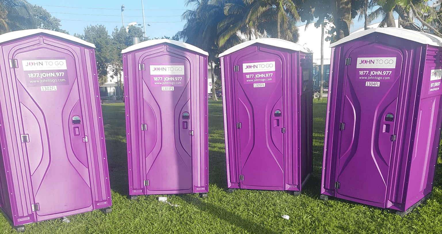 festival portable toilets on grass