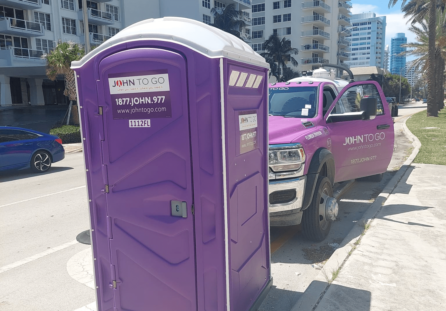 service truck near construction site portable toilets