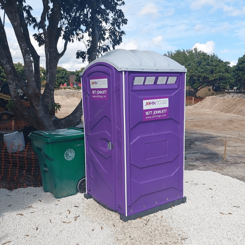 Porta potty positioned near a construction site