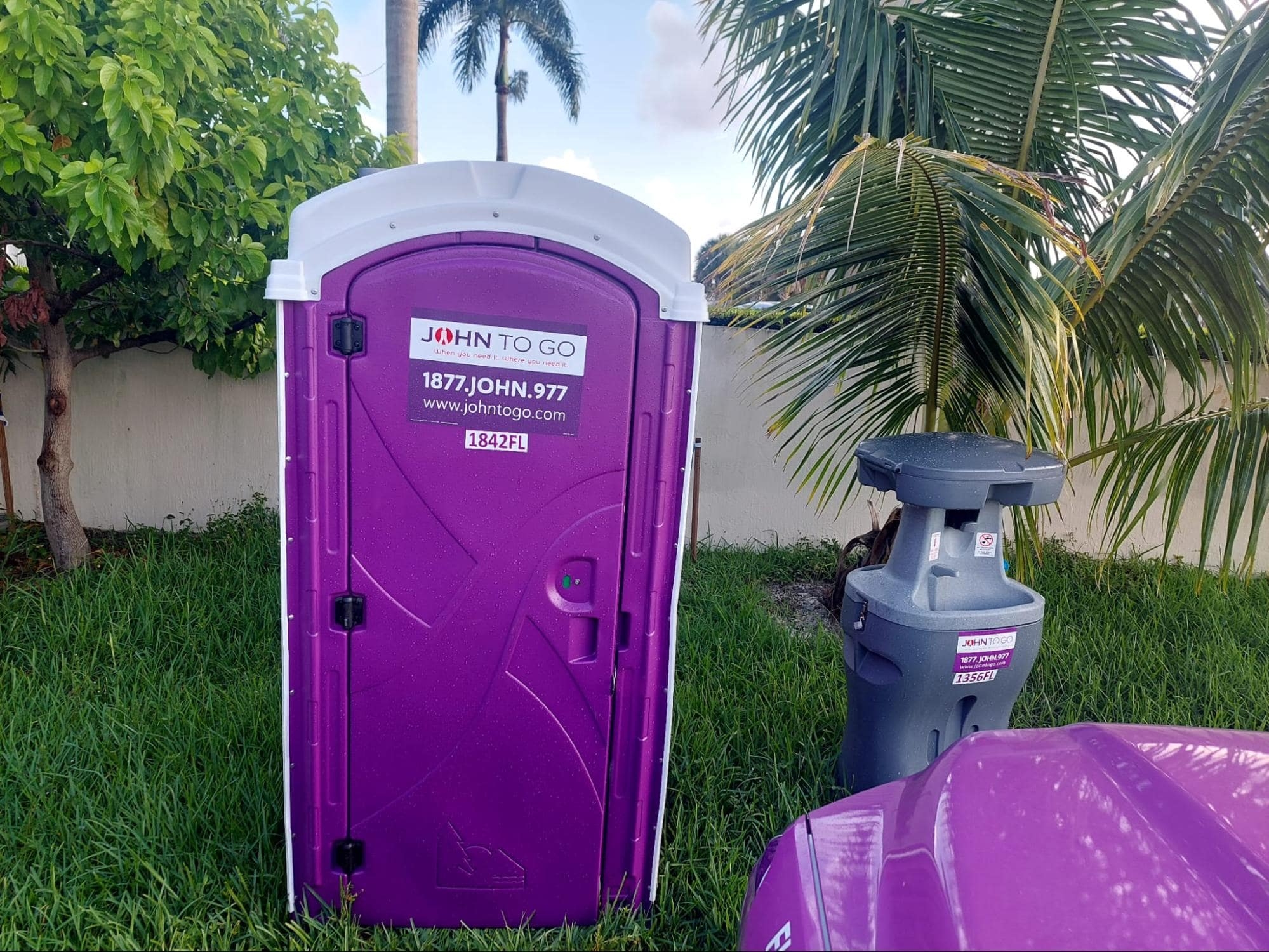 Portable toilets with a hand washing station