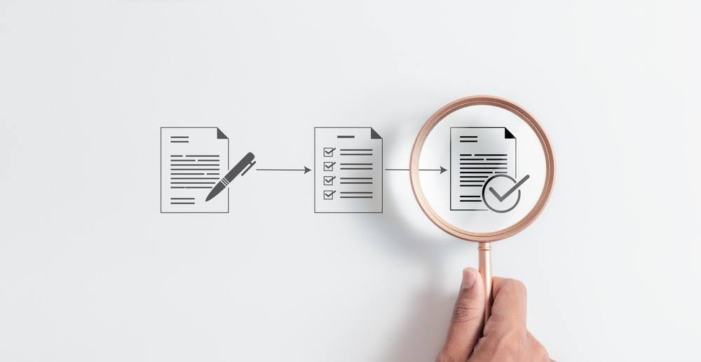maqgnifying glass over graphics of documents